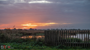 zonsondergang bij de Mijmerbank De ONlanden